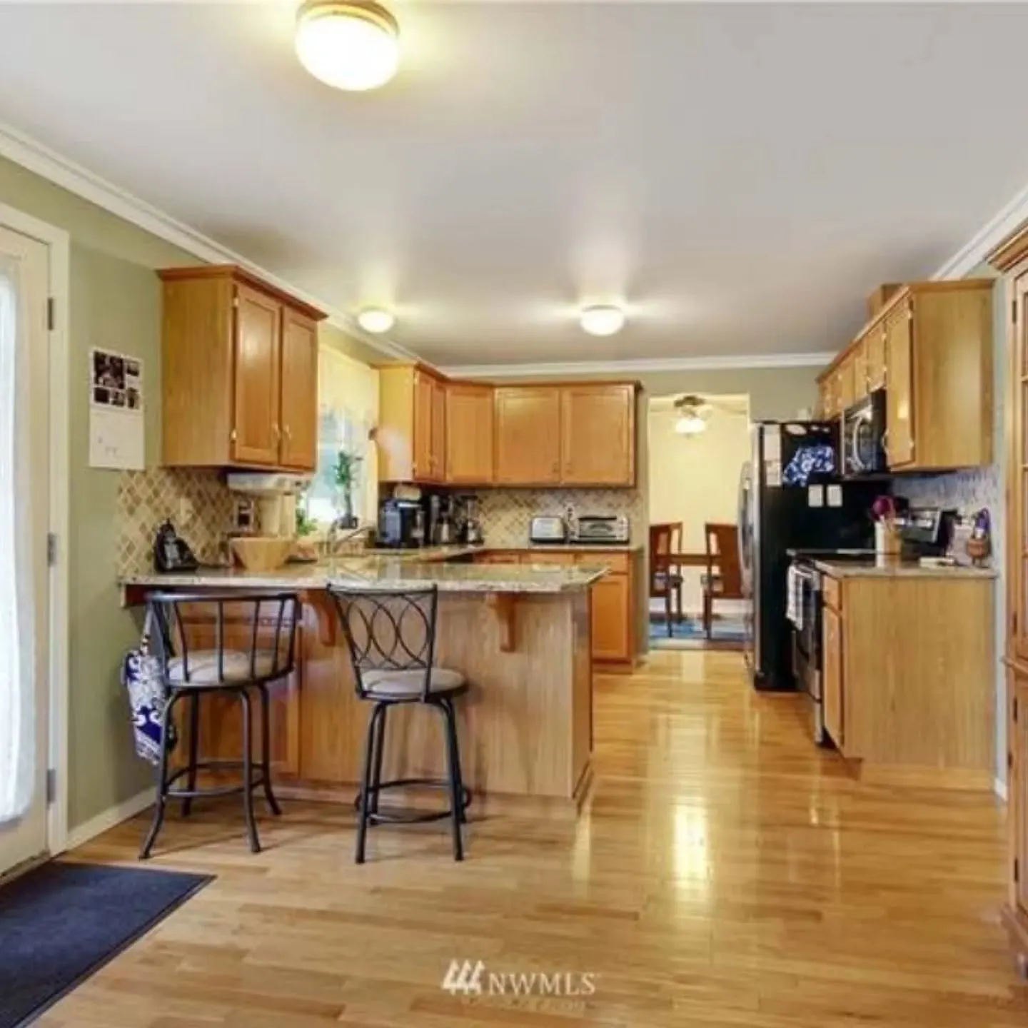 Kitchen and breakfast bar before the update